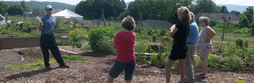 Jim Walck conducts a workshop on rainwater harvesting at the Butler Township Community Garden