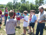 Rick Mikula (the Butterfly Guy) instructs children during the Garden Discovery Camp